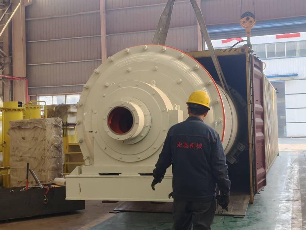 Ball mill loaded into a container at the manufacturer's facility